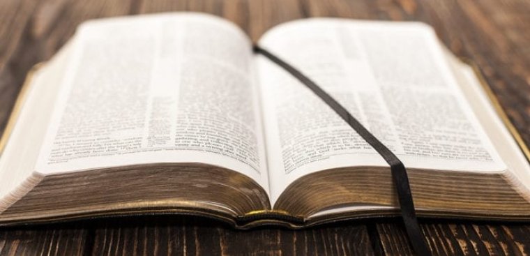 Baptist Distinctives, opne bible on a table