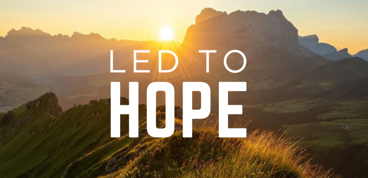 Led to hope background pic, with sunset and mountains. 