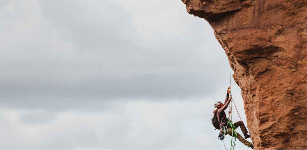 Man climbing on a cliff